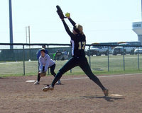 Image: Freshman Lady Gladiator Megan “Rich” Richards — With perfect form and precision the Lady Gladiator Softball team went 5 and 1 in The Classic of Ellis County softball tournament as illustrated by Megan Richards on the mound while Courtney Westbrook shows the defensive “ready” position on third base.