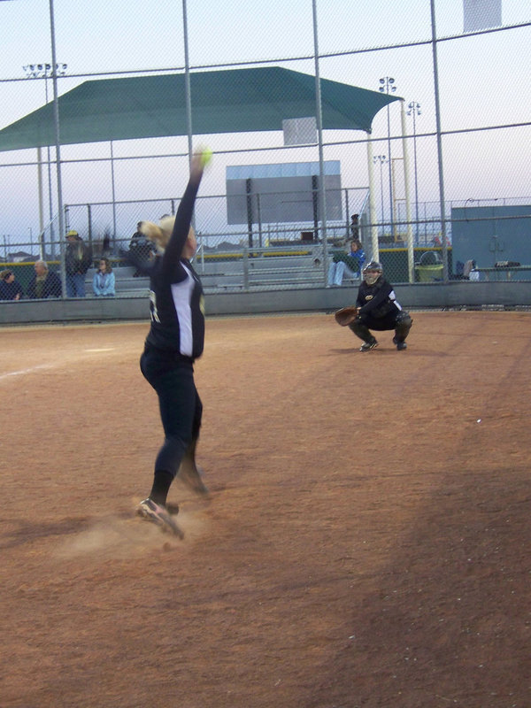 Image: Pitcher/Catcher Warm-ups — “Rich” and “Jules” warming up before the Covington game Friday night.