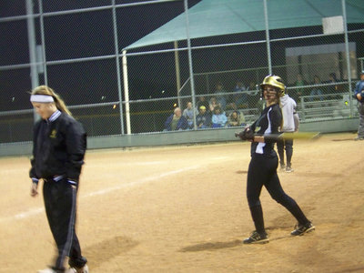 Image: Smiles — Coach and Abby Griffith are all smiles before her at bat.