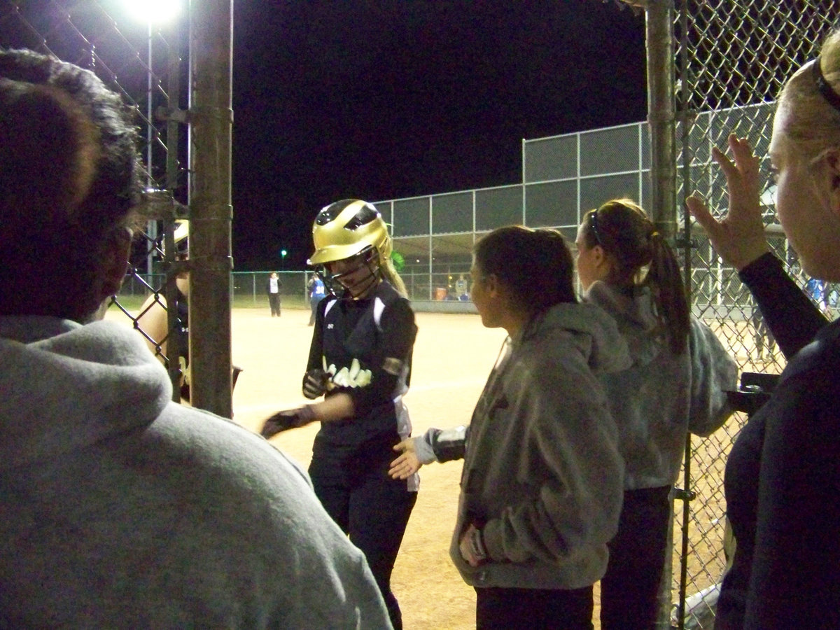 Image: High Five — “Rich” is ready to give “Abby-G” a high five after she scored for the Lady Gladiators.