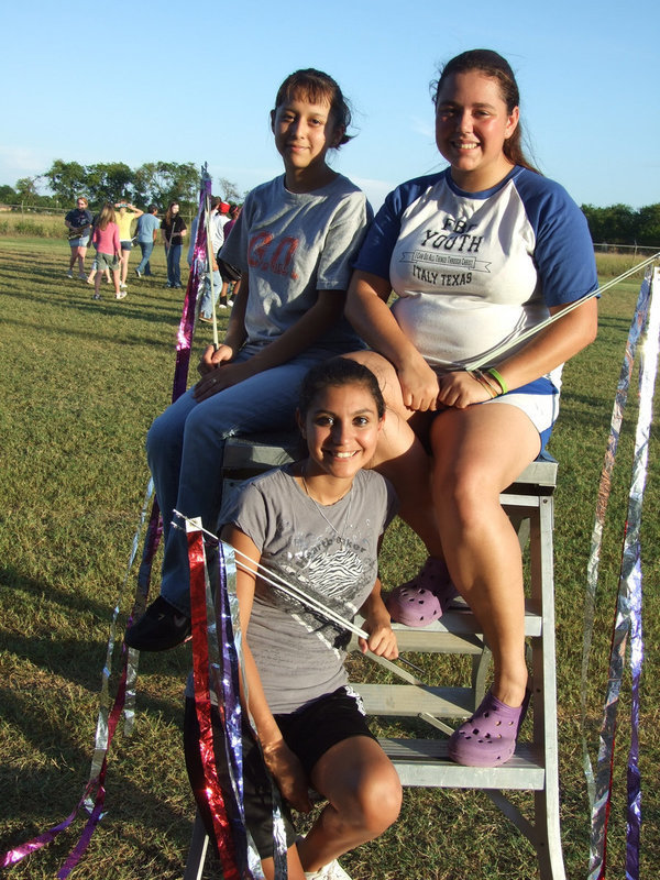 Image: Flag Corp — (L-R) Delma Garcia, Nikki Brashear-Captain 
    (Bottom) Yesenia Sam
    Missing Megan Buchanan and Maria Estrada