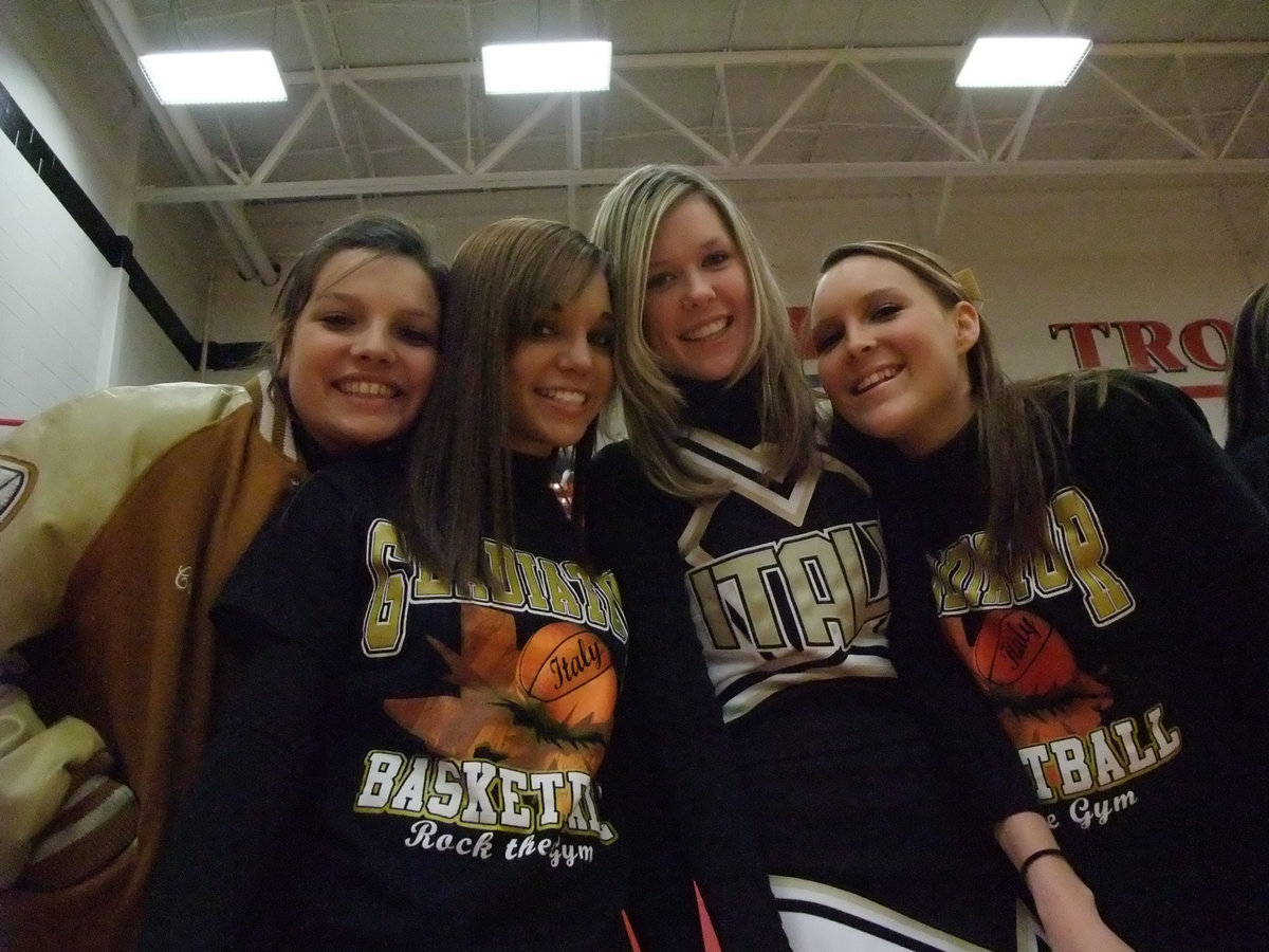 Image: Cheerful Cheerleaders — The cheerleaders were all excited and a little nervous before the game.