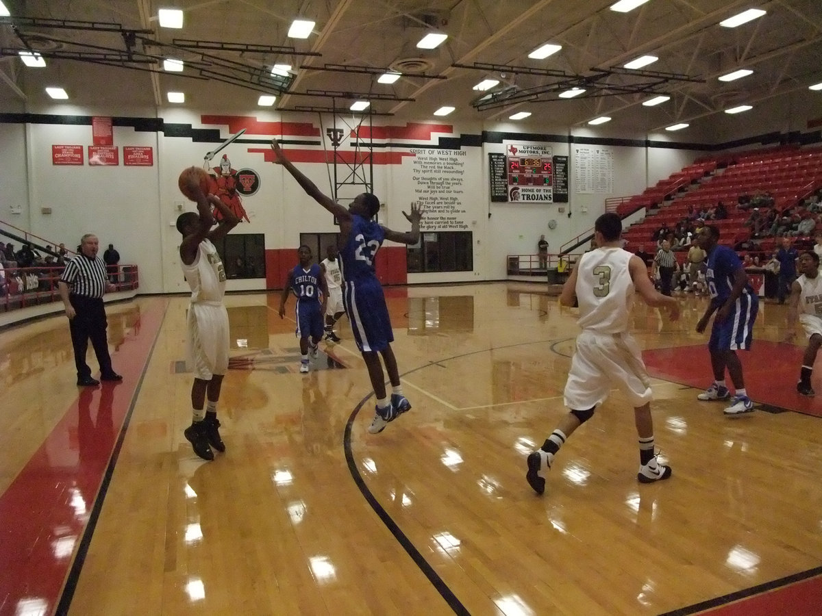 Image: Clemons tries again — If at first you succeed…try, try again. So Italy’s Heath Clemons #2 tries for another 3-pointer against the Pirates.