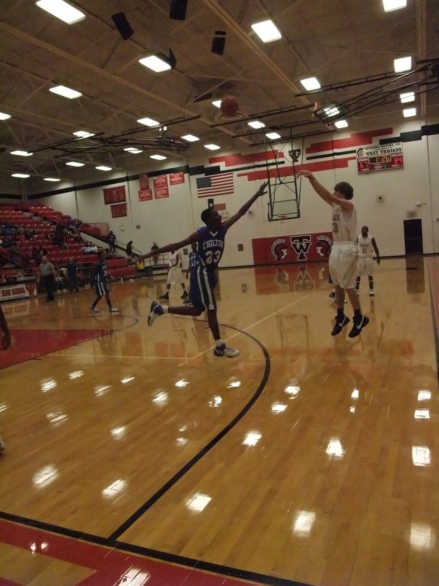 Image: From 3-point land — Italy’s Colton Campbell #13 had 7-points in the contest including one, 3-pointer.