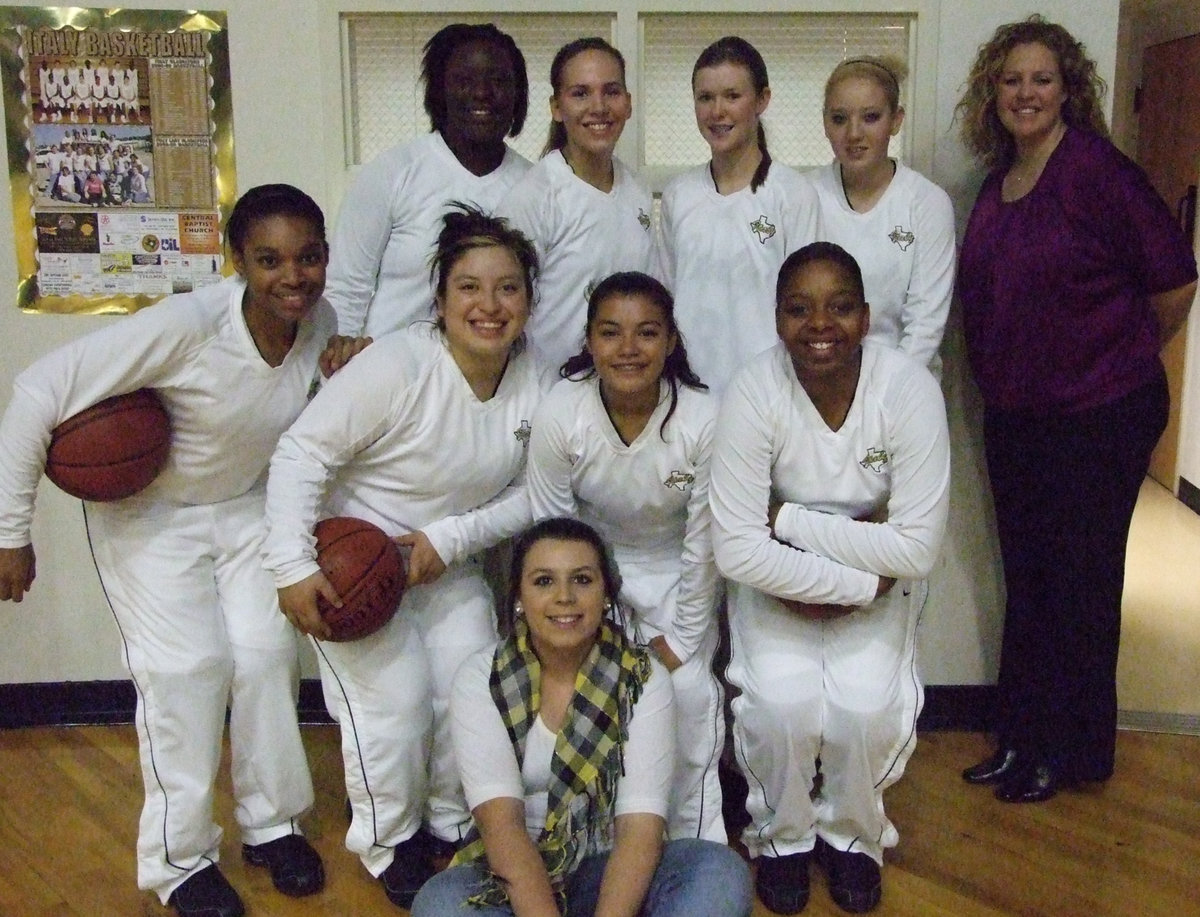 Image: Beauties And Braun — District has begun for the Lady Gladiators.  They hosted Itasca at the dome Friday night.
    (Back row L-R) Jimesha Reed, Becca DeMoss, Kaitlyn Rossa, Megan Richards and Coach McDonald. (Second row L-R) Kyonne Birdsong, Blanca Figueroa, Marisela Periz and Jaleecia Fleming. (On the floor) Manager, Molly Haight.