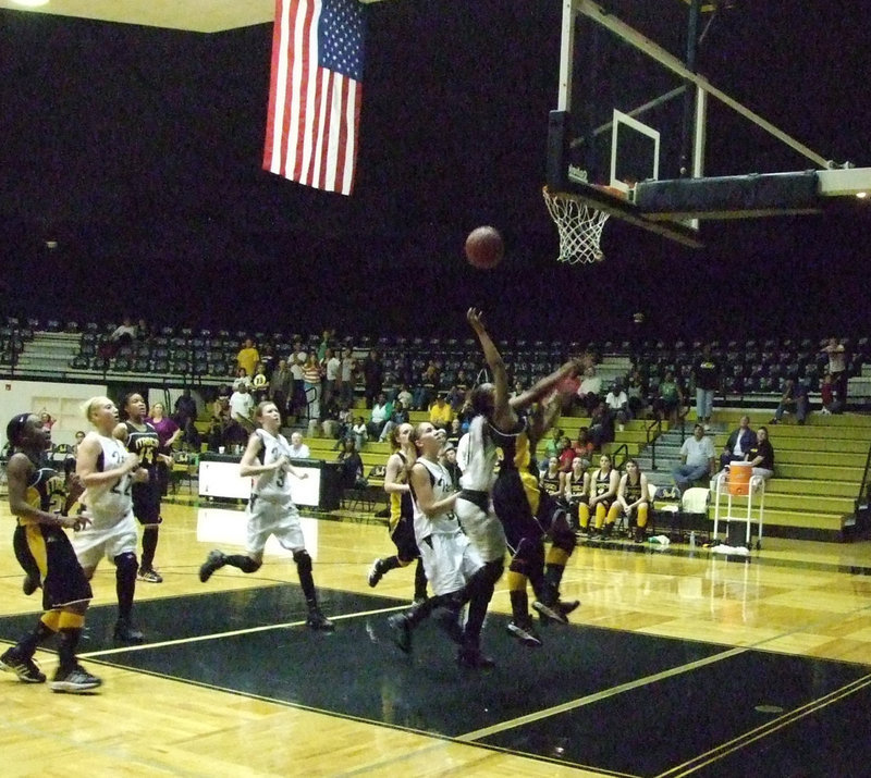 Image: One more hoop — Lady Cats offense remained strong throughout the game.