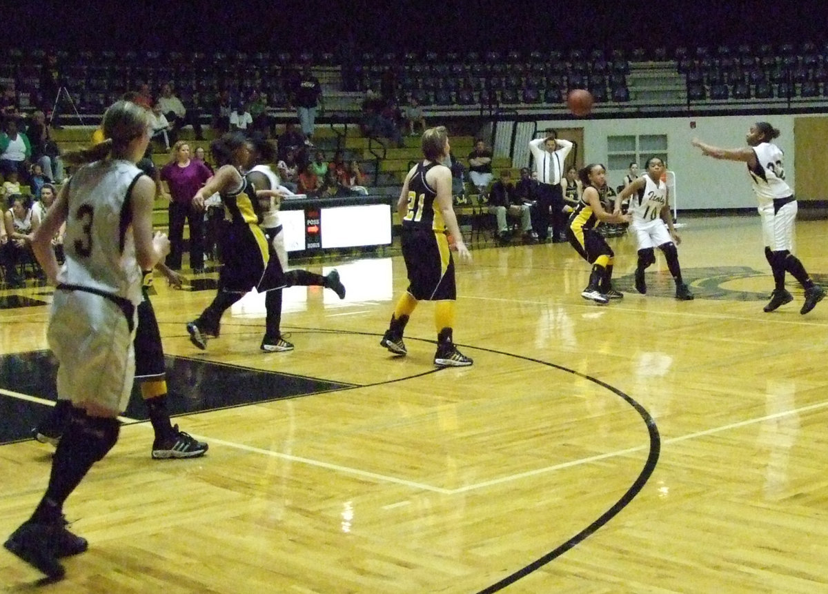 Image: Fleming passes — Shay Shay Fleming keeps the ball moving.