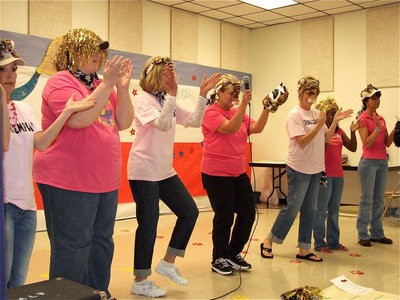Image: The Tigerettes — Principal Wallis received plenty of cheer help from her fellow faculty members.