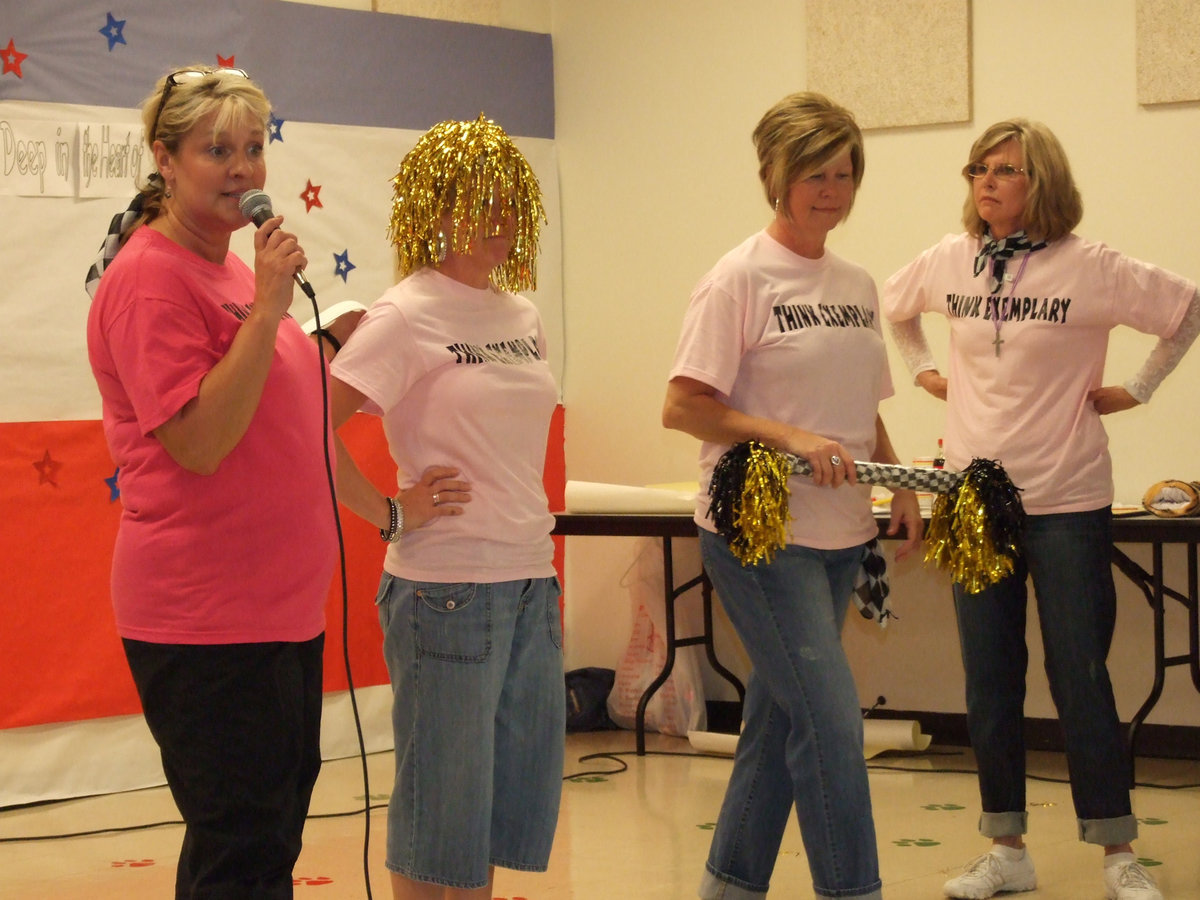 Image: Incentive Program — Principal Wallis allows the students to decide which new hair color would look good on teacher, Angie Janek, once the 5th graders conquer their TAKS tests.