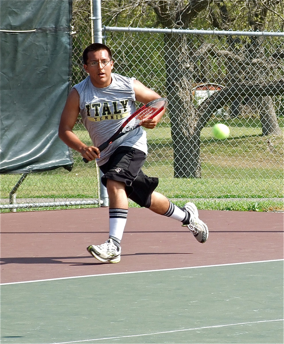 Image: On the move — Italy’s Jacob Lopez works the baseline against Rice.