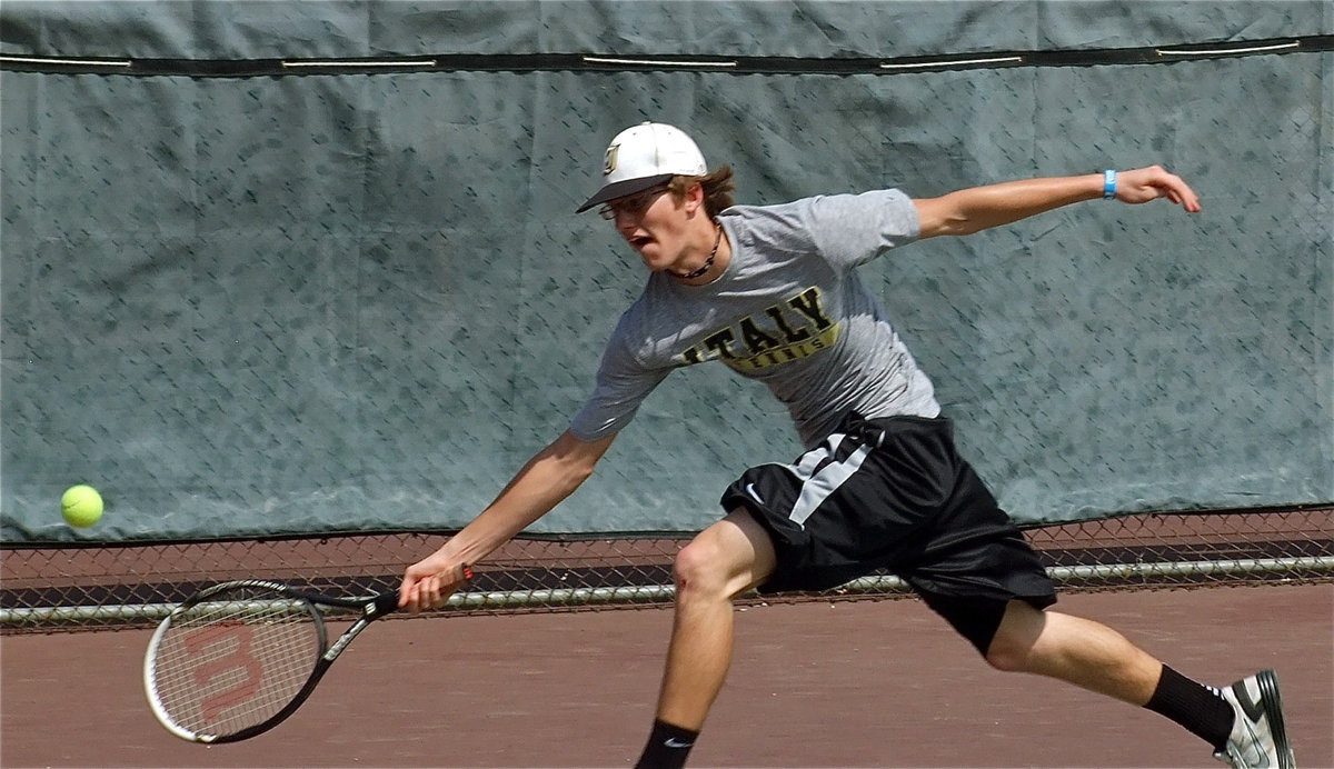 Image: Holden has game — Jase Holden lunges for a cross-court shot.