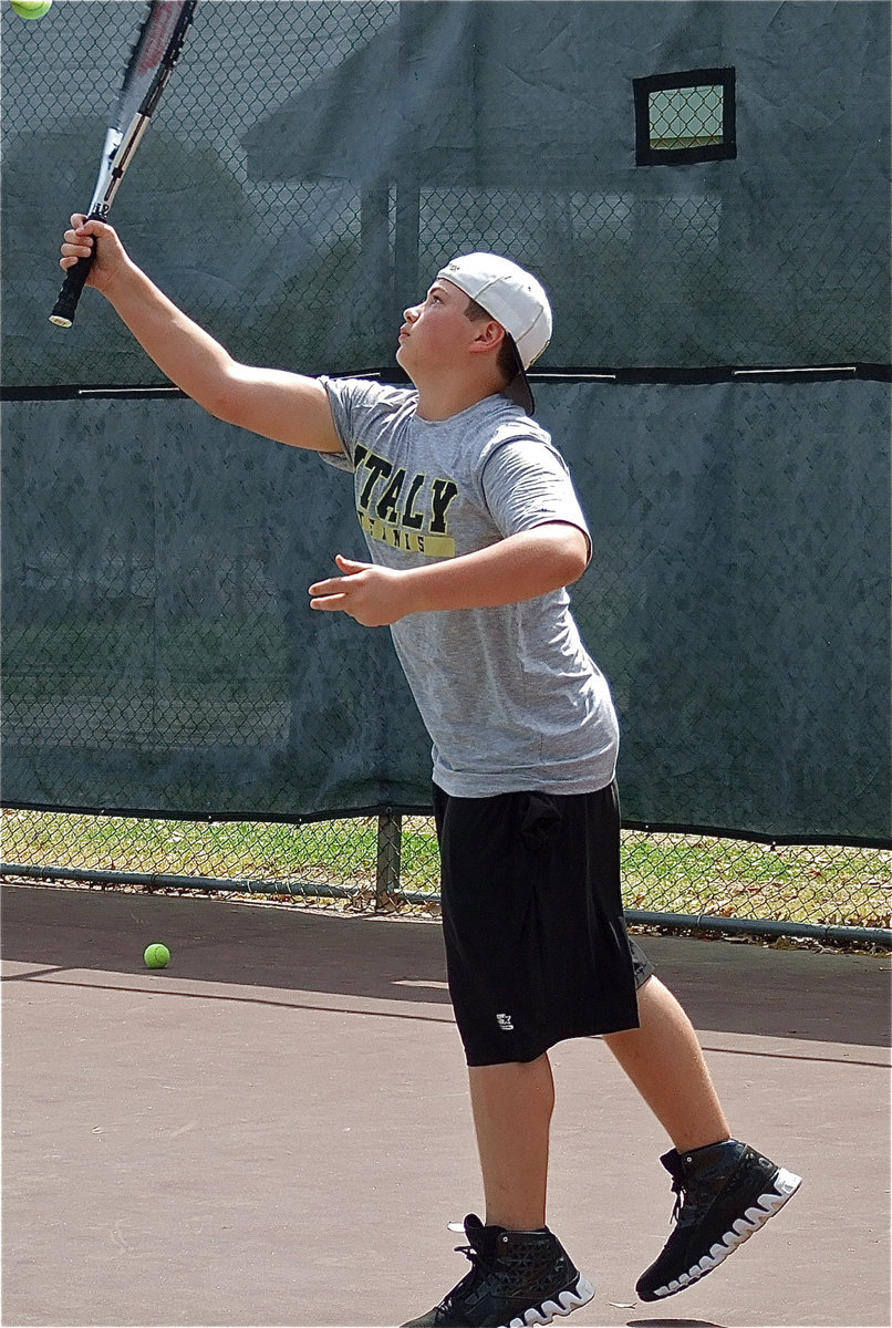 Image: Victory is served — Zain Byers tries to put pressure on Wortham with his deceptive serve.