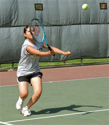 Image: Jessica has skills — Jessica Garcia helps her doubles partner, Drenda Burk, reach the JV Championship match.