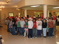 Image: Second Graders — Second Graders spreading Christmas cheer to the residents.