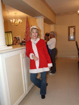 Image: Jan Shepard — Even a cute “Mrs. Claus” showed up the help spread Christmas cheer.