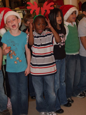 Image: Singing Up A Storm — Second graders singing Rudolph right!