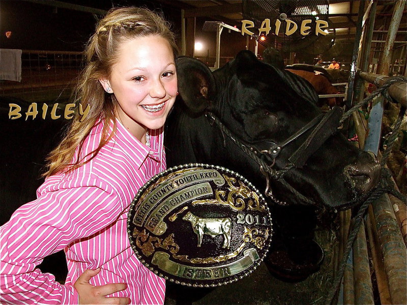 Image: Bailey Eubank and her steer, Raider, take the top prize — Bailey Eubank and her steer, Raider, won grand champion steer during the Ellis County Youth Expo in Waxahachie on Thursday. Eubank was the reserve champion last year.