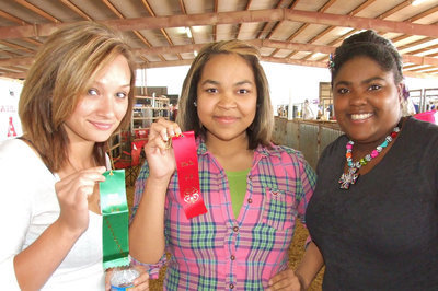 Image: Cooking good — Courtney Russell, Destani Anderson and Sa’Kendra Norwood brag on their FCCLA food entries.