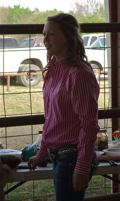 Image: It’s go time — Behind the scenes with Bailey Eubank as she preps her British steer, “Snookie,” for the show ring.