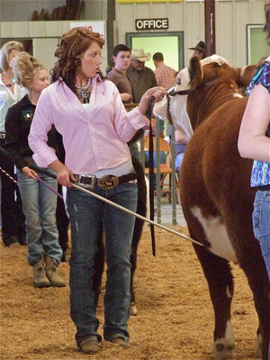 Image: Bumpus has skills — Bailey Bumpus skillfully keeps her animal under control during the judging.