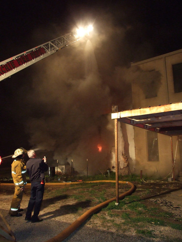 Image: More water — Waxahachie’s Ladder 3 truck attempts to drown the fire from above.