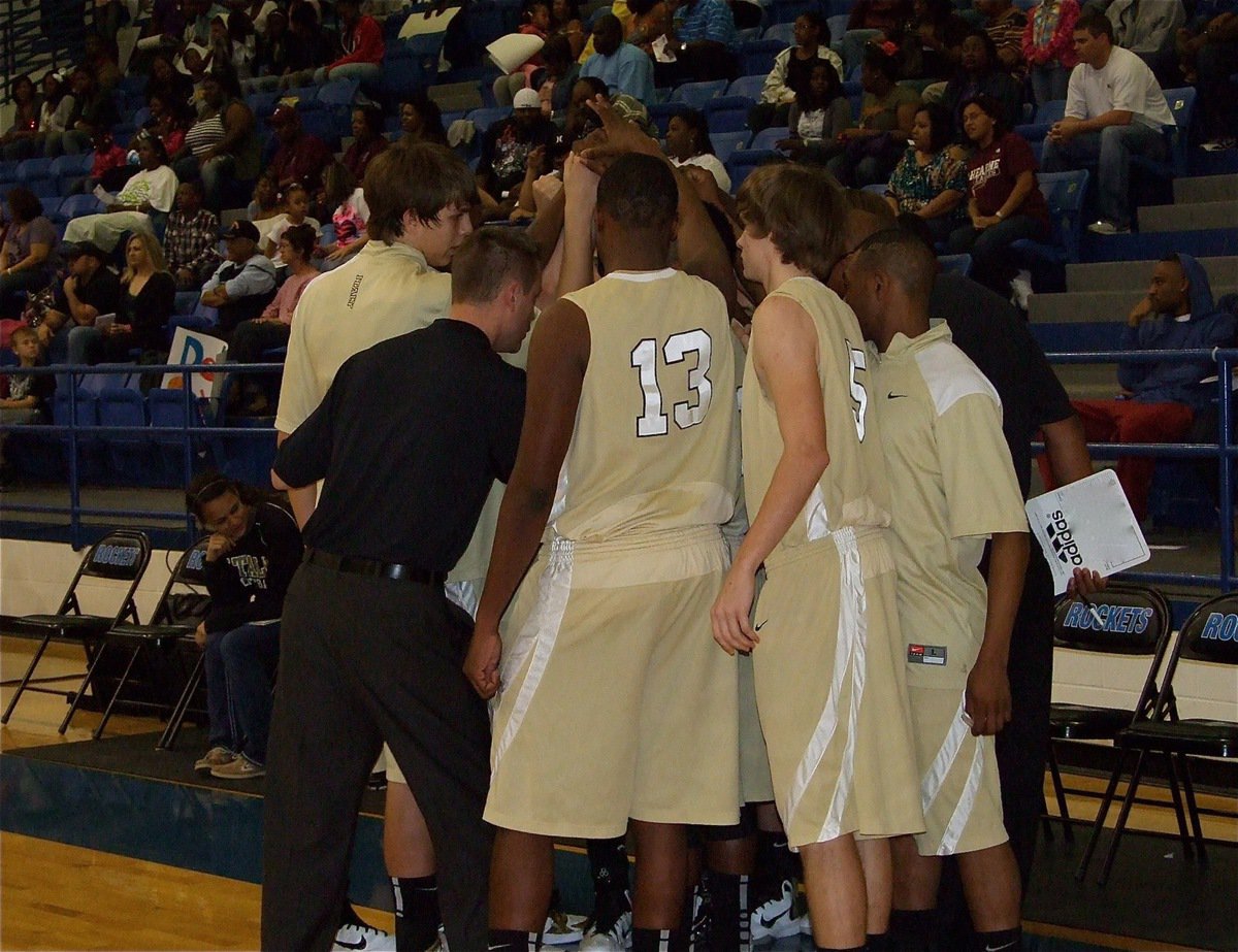 Image: All in! — Head Coach Aidan Callahan gives some last second tips before the Gladiators take the court at Waco Robinson High School.