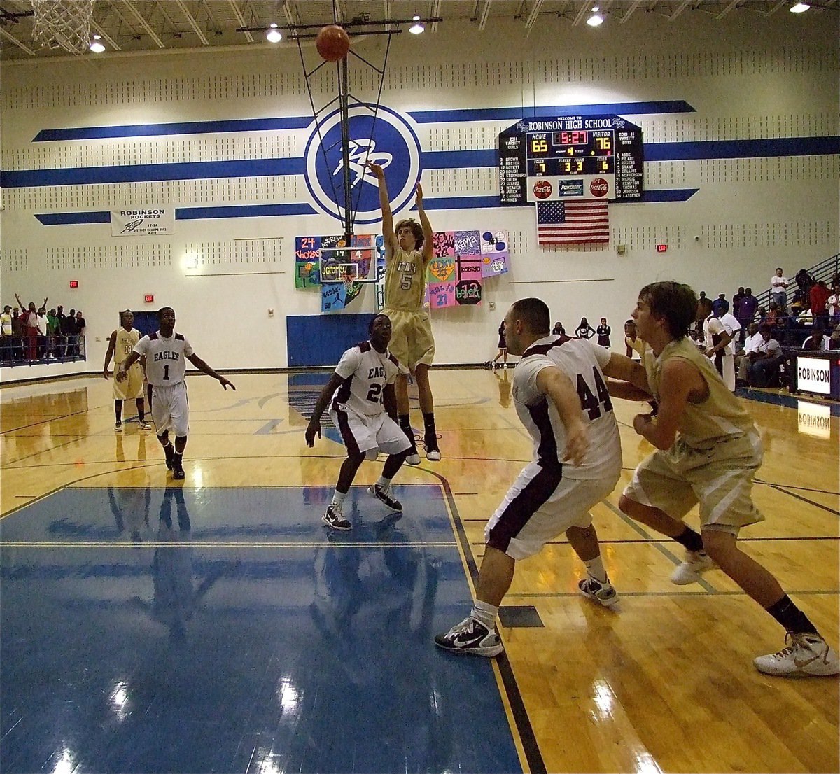 Image: Keep firing away — Italy’s Colton Campbell(5) put up a jump shot from the elbow midway thru the fourth quarter as Cole Hopkins(21) battles with Hearne’s big man.