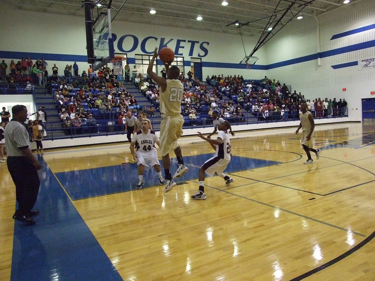 Image: Skill shot — De’Andre Sephus(20) swishes a baseline jumper and finishes with 4-points.