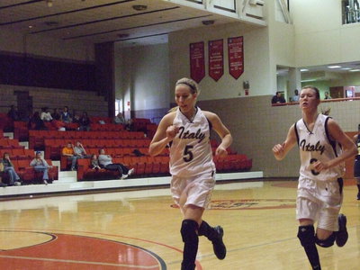 Image: Leading The Way — All hustle during the game and into the locker room at halftime are DeMoss and Rossa.
