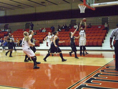 Image: Shay What? — Junior #32 Shay Fleming scores using a left handed layup.