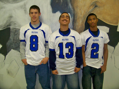 Image: All-Region 1st Team Defense — Blue Myer #8, Rolando Vega #13 and Derek Williamson #2.