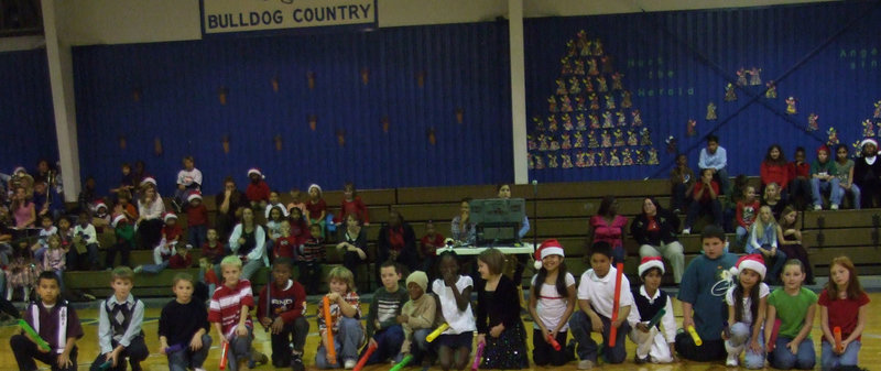 Image: Third Graders — Third graders performing O’Tannenboom on their “boom whackers”.