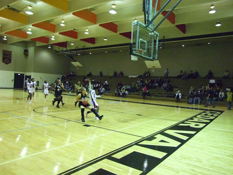 Image: DeMoss Jump Stops — DeMoss Jump Stops and pops against Dallas Gateway.