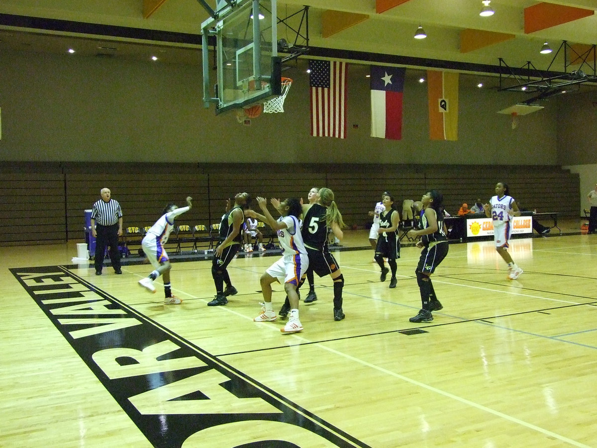 Image: Forcing A shot — The Gladiators zone forces a bad shot by the Gators.