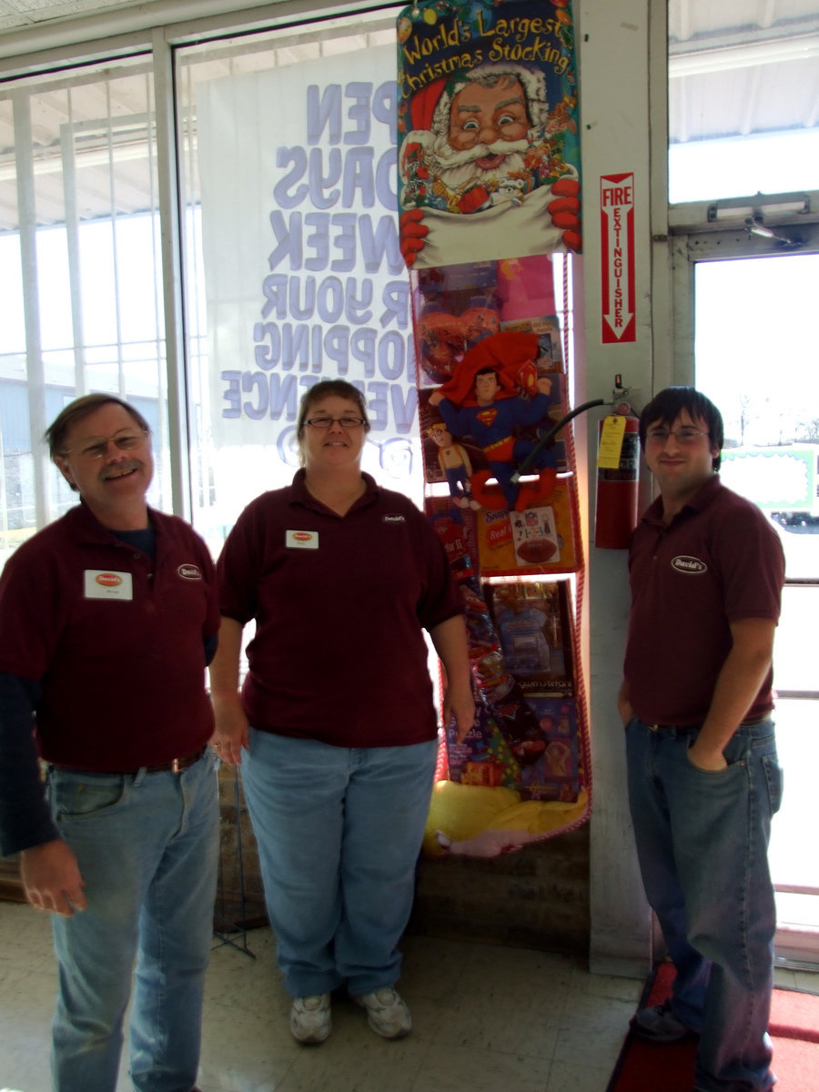 Image: David’s Supermarket employees — Mike Nicholson (store manager),Desiree Hernandez and Craig Nuckolls happy employees wishing you good luck!