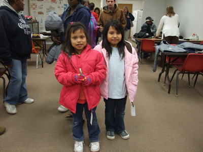 Image: Two Happy Girls — These two little girls were very proud of their coats.