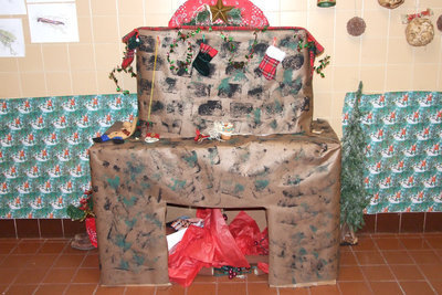 Image: Country Christmas — This “Country Christmas” has a homemade fireplace included.