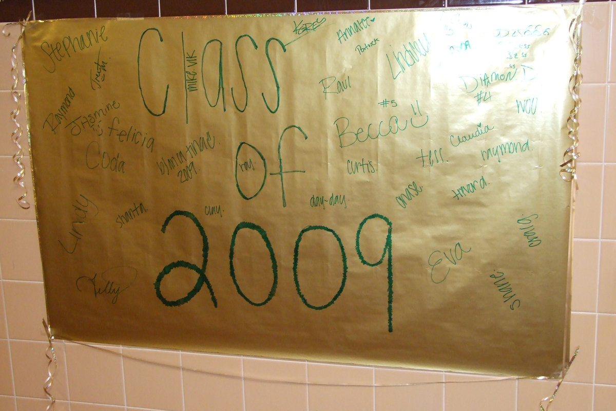 Image: A wall Christmas card — Everyone signed the Christmas card and wishes everyone Merry Christmas.