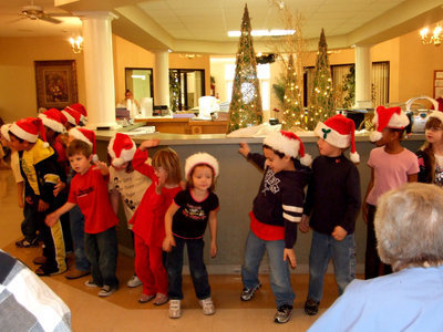 Image: “Feliz Navidad” — Kindergarteners getting into the swing of Christmas.