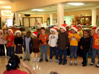 Image: Let’s Sing Rudolph — Stafford students singing their rendition of “Rudolph the Red Nosed Reindeer”.
