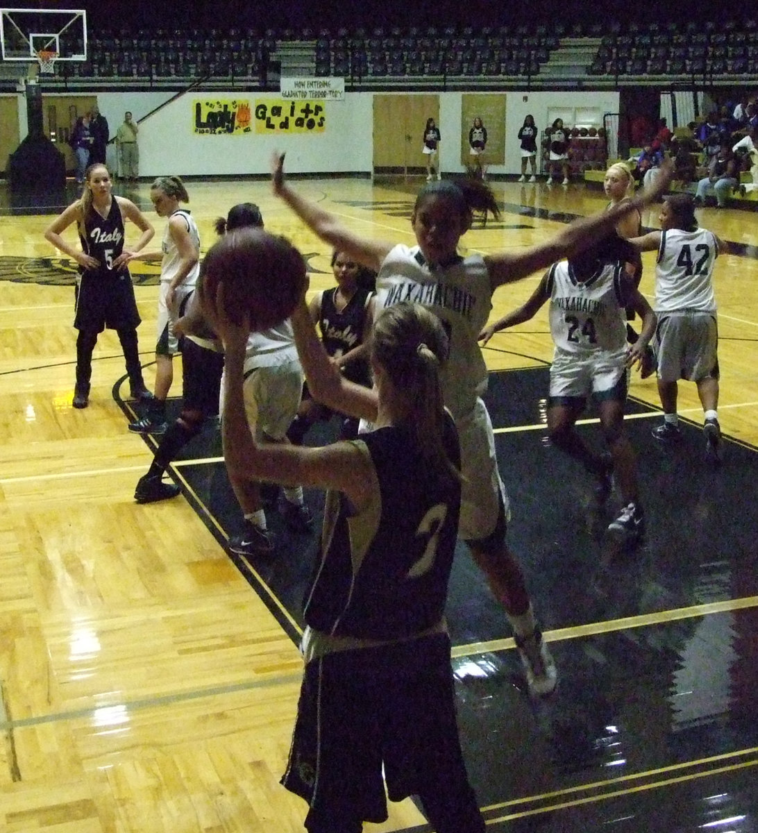 Image: Kaitlyn Rossa Inbounds — Freshman #3 Kaitlyn Rossa tries to inbound the ball as #5 Becca DeMoss plays possum.