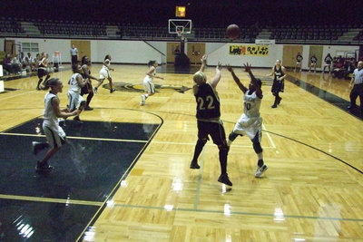 Image: Outlet Pass — Italy’s #22 Megan Richards rebounds and outlets to Becca DeMoss to start the Lady Gladiators fast break.