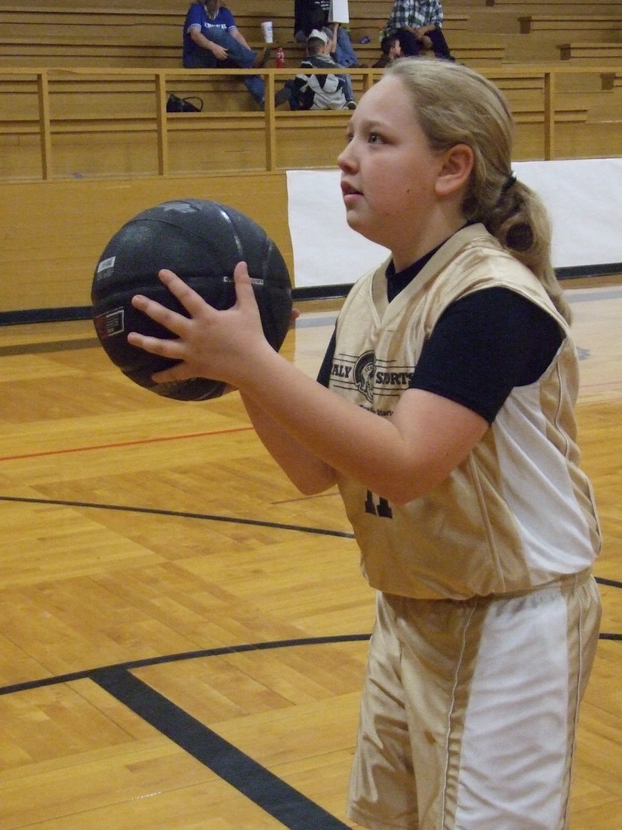 Image: Brycelen Richards — Brycelen Richards(11) takes a free shot at halftime.