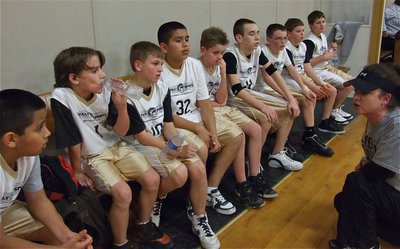 Image: Windham’s Warriors — Italy 30 coach Andrea Windham talks over the game plan with her players. And when Coach Windham talks…
