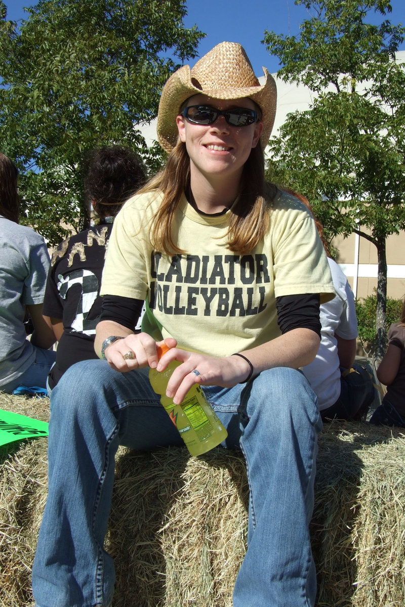 Image: Coach Reeves — Coach Reeves manned the volleyball float in the Homecoming Parade.