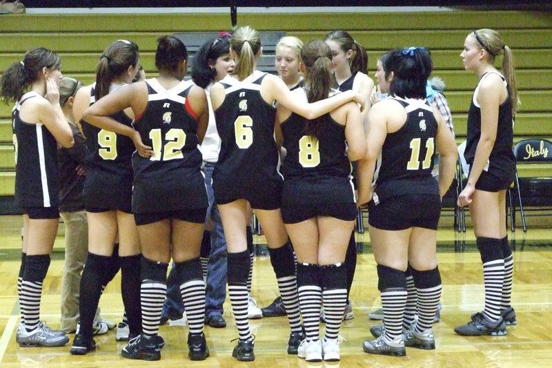 Image: Last huddle — Coach Windham told the girls how proud she was for their hard work this season.