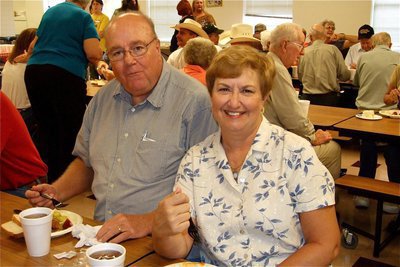 Image: Doing their part — Bob and Connie Reeves remember an old friend while helping with his cause.