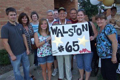 Image: Jimmy Walston and family — Jimmy Walston (65), a member of Italy’s undefeated and unscored upon 1940 Football Team, and his family celebrate outside the 18th Annual George Scott Memorial Scholarship Dinner at Italy High School.