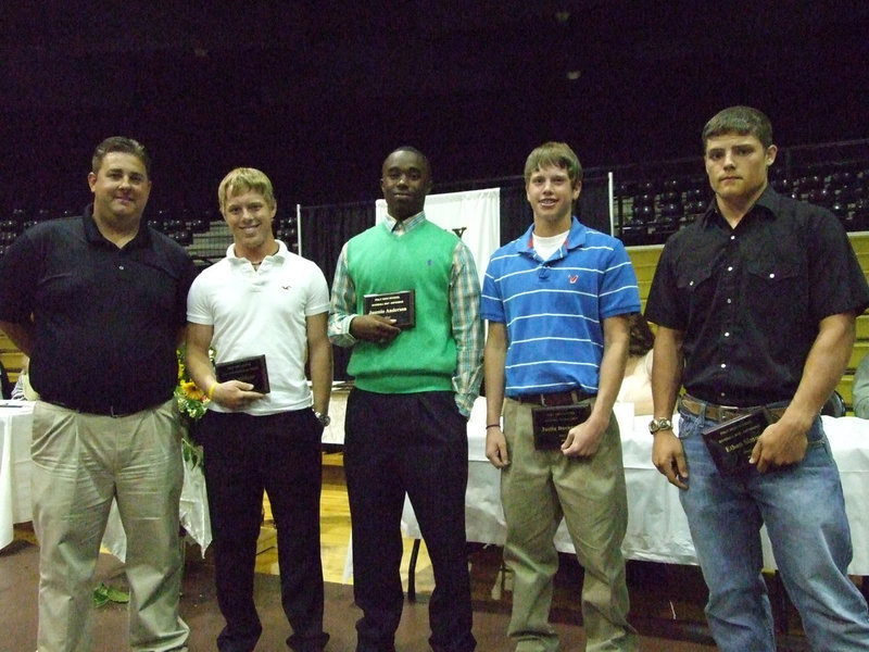 Image: We are among royalty — Head Coach Matt Coker, Loyd Davidson Award winner-Josh Milligan (1st team all-district infield), district Offensive Player of the Year-Jasenio Anderson, district MVP-Justin Buchanan and 1st team all district outfield-Ethan Simon.