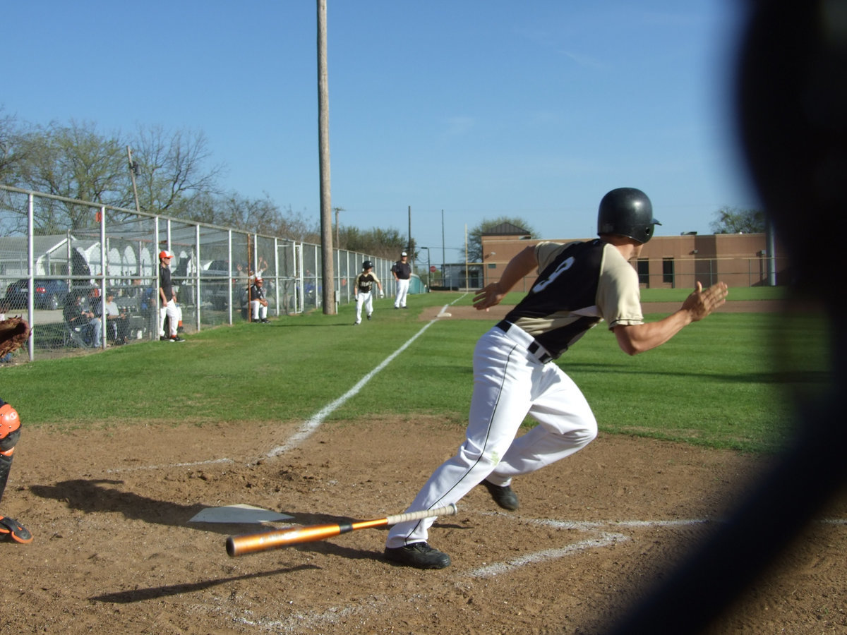 Image: Ethan gives it all he’s got — Junior Ethan Simon (1st team all district-outfield) slugs one to centerfield.